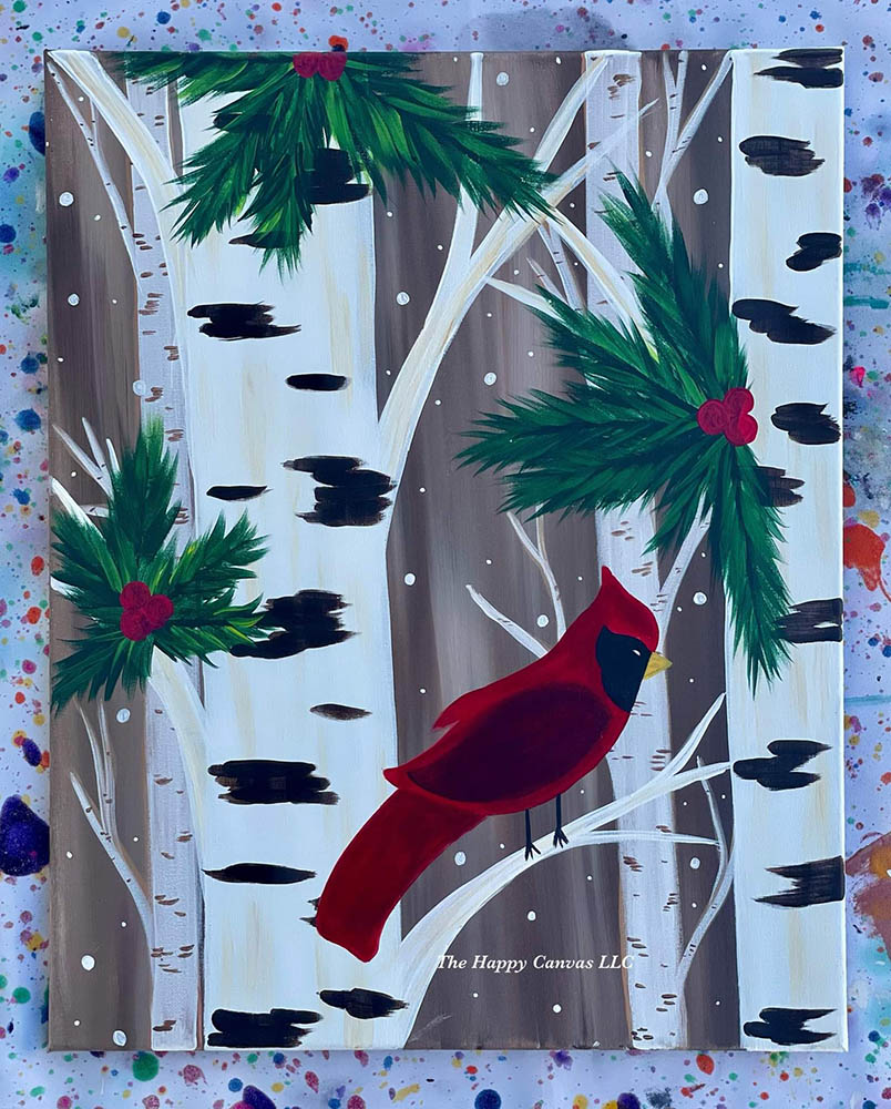 Red cardinal on christmas trees